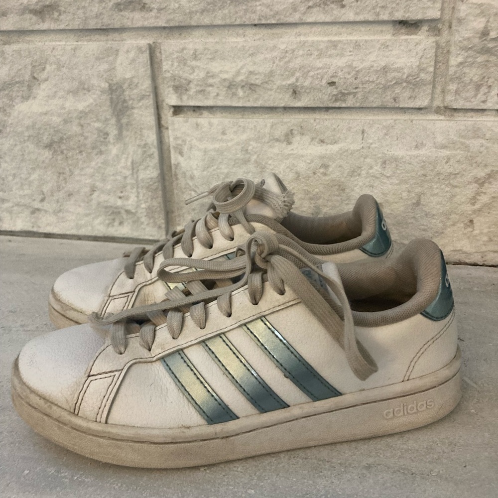 Adidas tennis shoes.